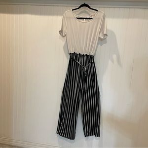 Francesca’s Soft Black & White Stripped Jumpsuit With Tie In Front